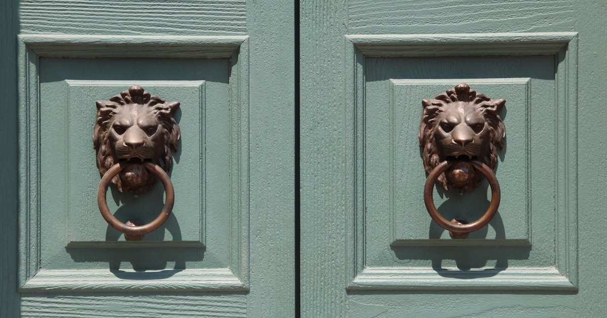 Lion door knocker brass